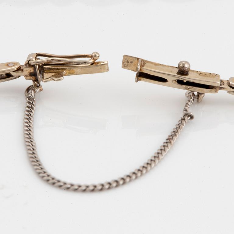 Armband 18K guld och vitguld med gammal- och åttkantslipade diamanter av CG Hallberg.
