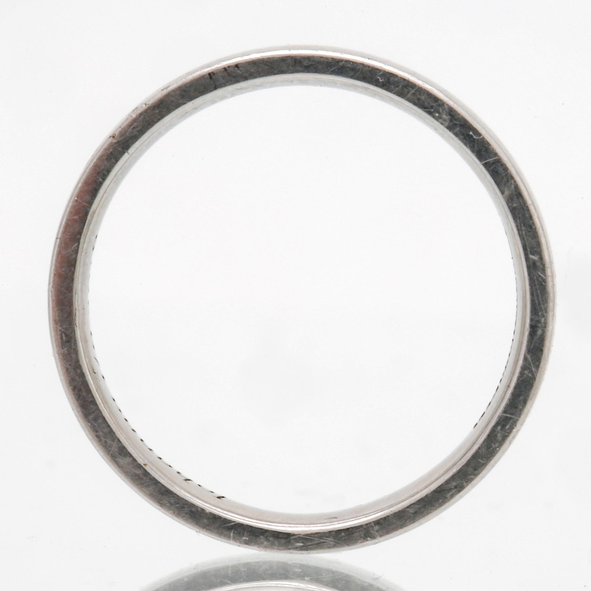 Wedding band platinum, 8,8 g, size approx 58,5, width approx 3 mm, Butler Malmö.