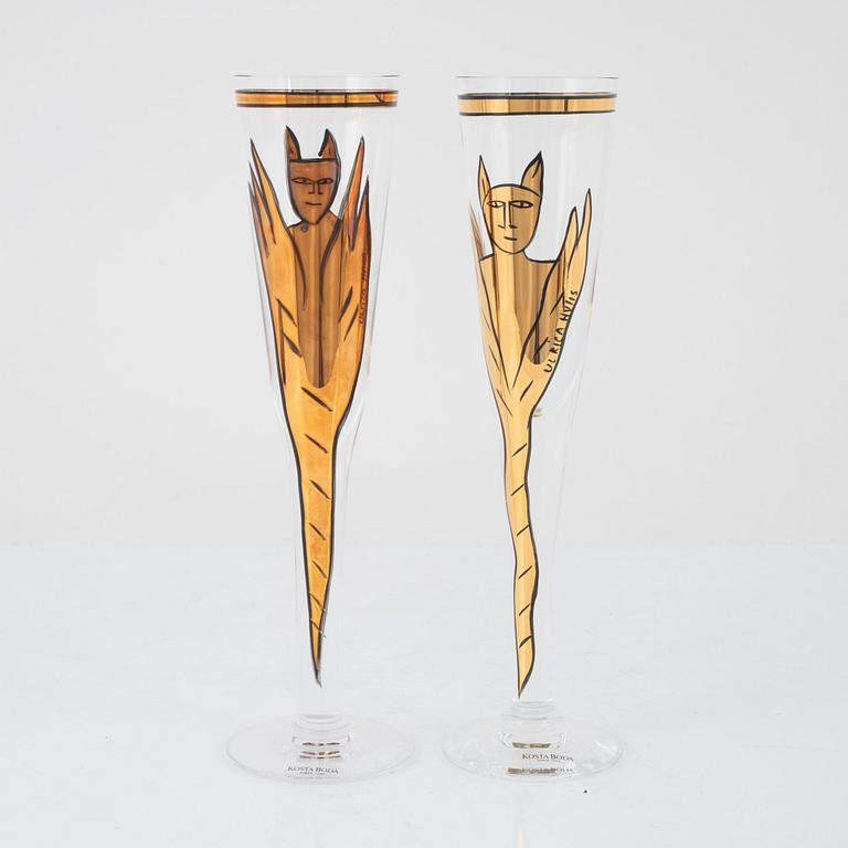 A set of 11 champagne glasses 'Goldie' by Ulrica Hydman-Vallien for Kosta Boda, Sweden.