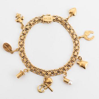 18K gold bracelet, with charms.