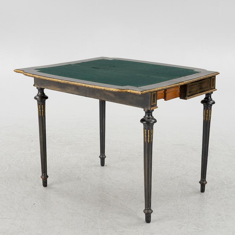 A Louis XVI style games table, circa 1900.