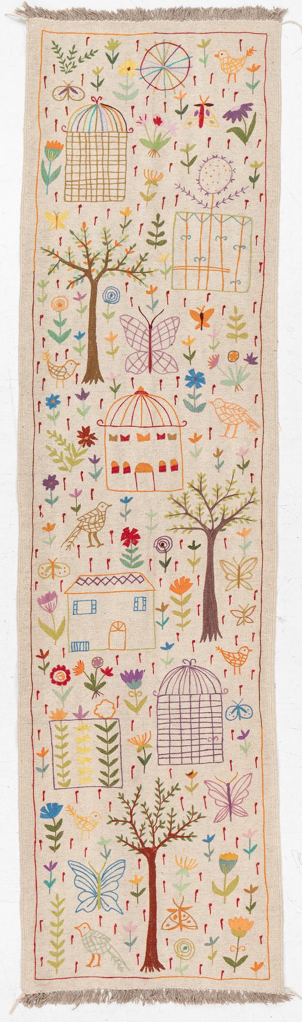 A hand-embroidered kilim runner, c. 300 x 80 cm.