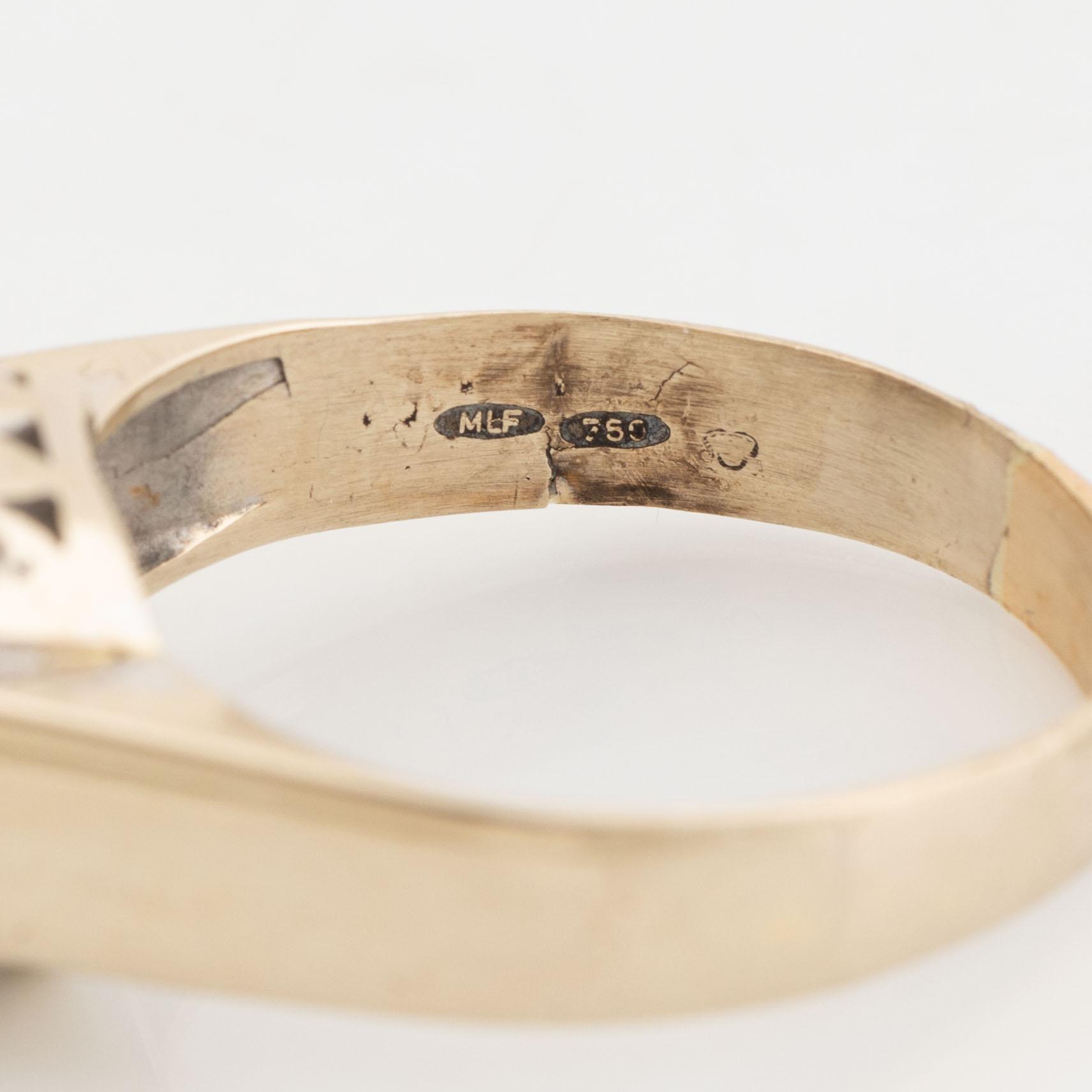 Emerald and diamond ring.