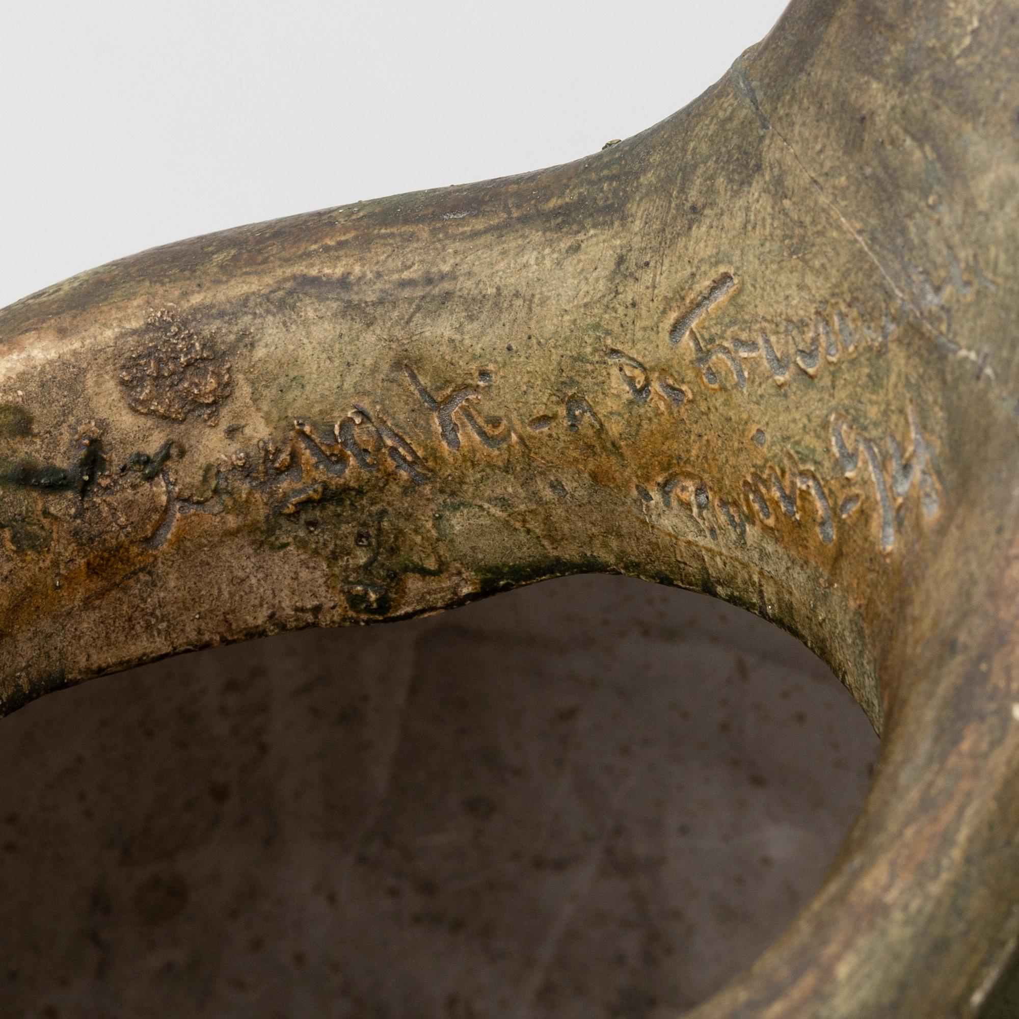 Agnes de Frumerie, an Art Nouveau plaster vase, Paris, signed and dated -94.