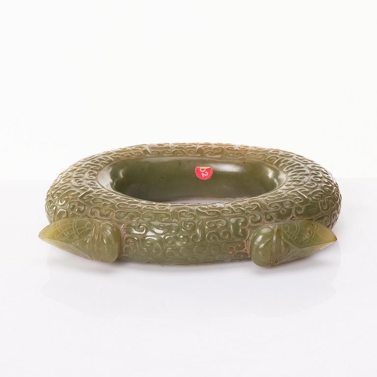 An archaistic sculptured nephrite ring with two cikadas.