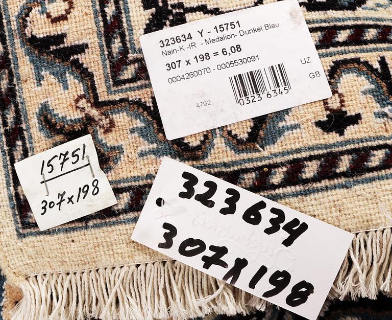 A carpet, Nain, part silk, ca 307 x 198 cm.
