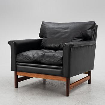Two leather upholstered sofas and an armchair, IKEA, Sweden, 1960's/70's.