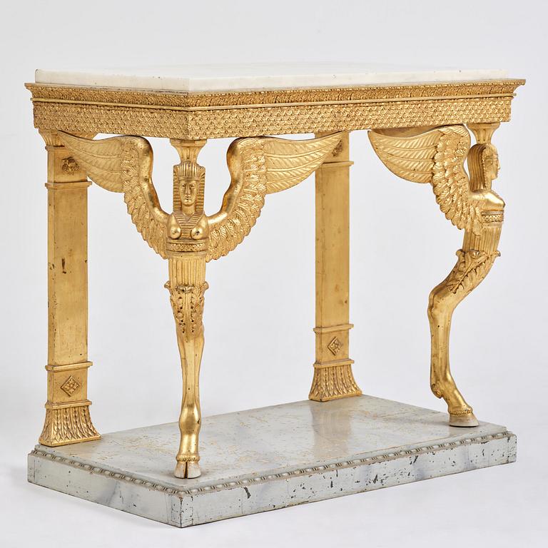 A late Gustavian giltwood console in the manner of J. Frisk, Stockholm, early 19th century.