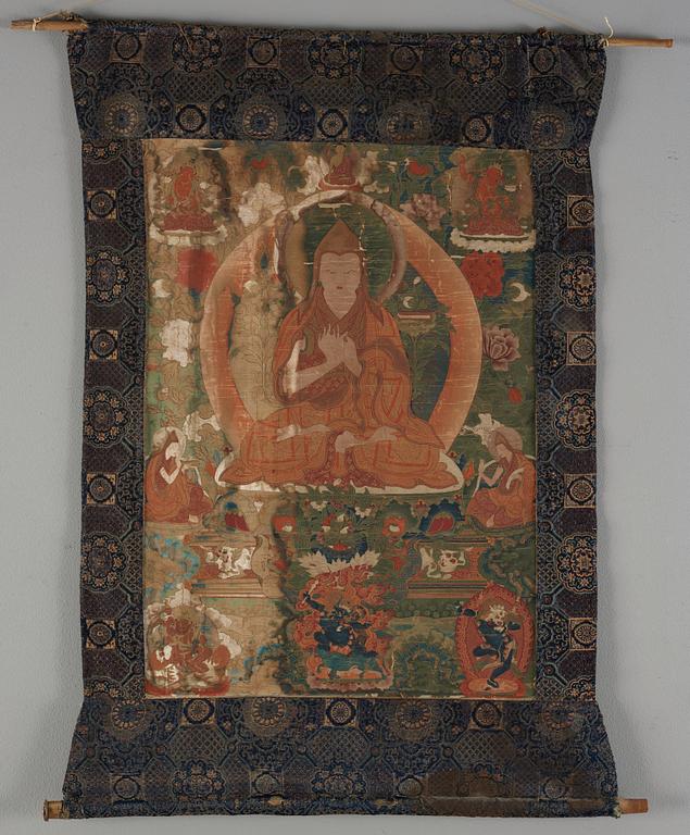 A finely painted Tibeto-Chinese thangka portraying Tsong Khapa, 18th/early 19th century.