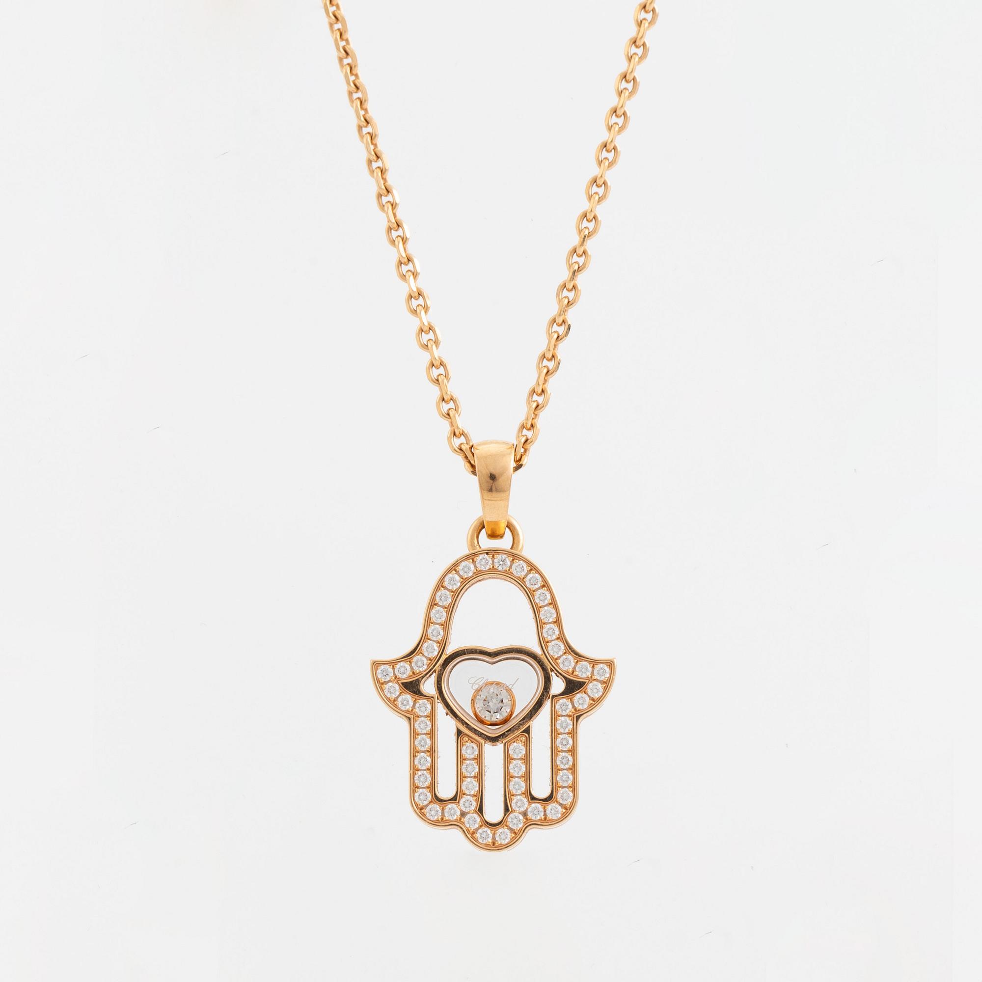 Chopard, Happy diamonds "Fatimas hand" 18K gold and brilliant cut diamond necklace.