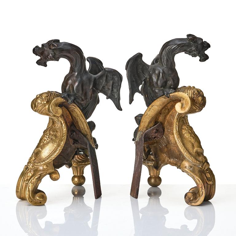 A pair of Rococo style 19th century  gilt and patinated bronze dragon chenets.