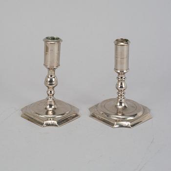 Two Swedish 18th century candlesticks.