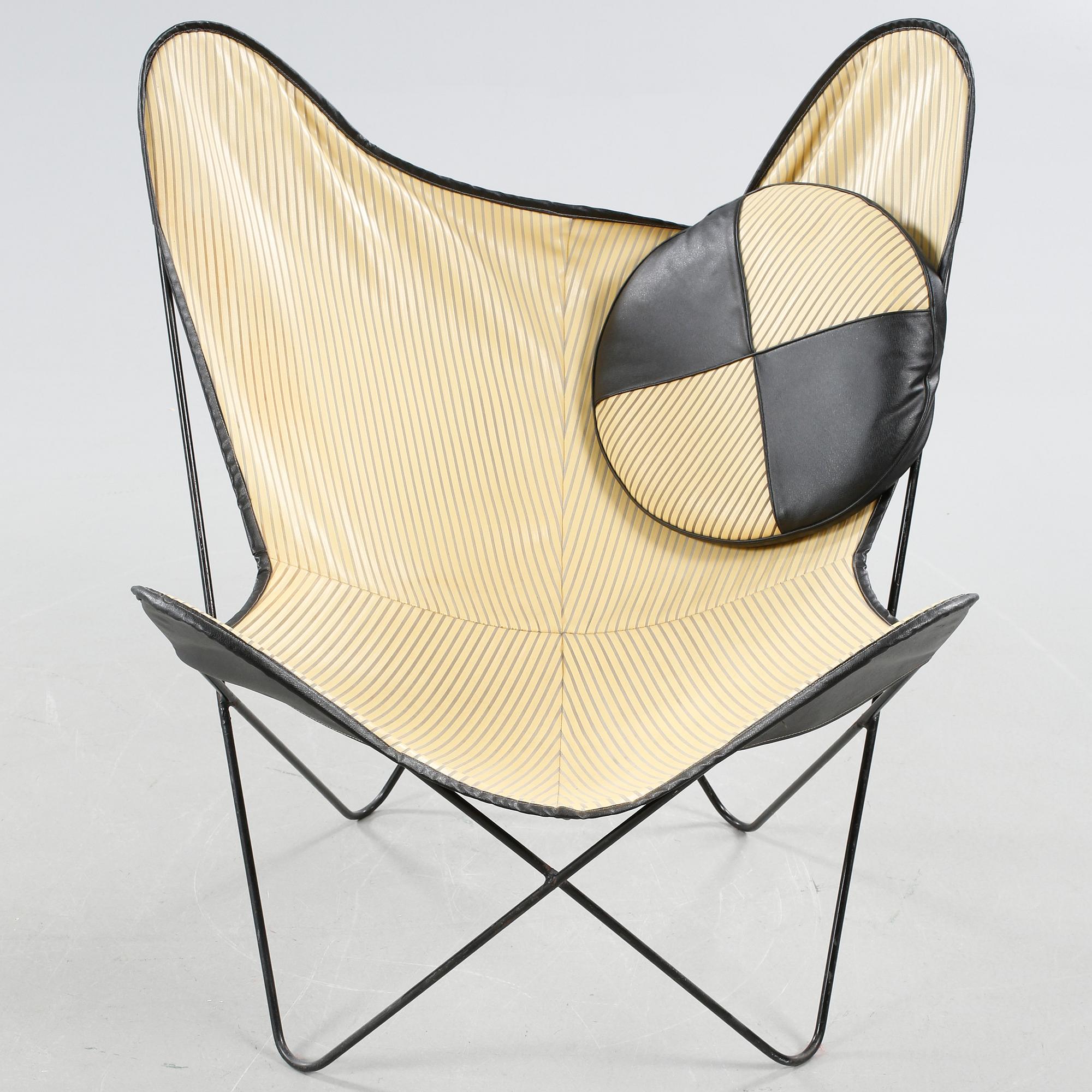 A chair, so called bat chair, made in the mid 20th century.