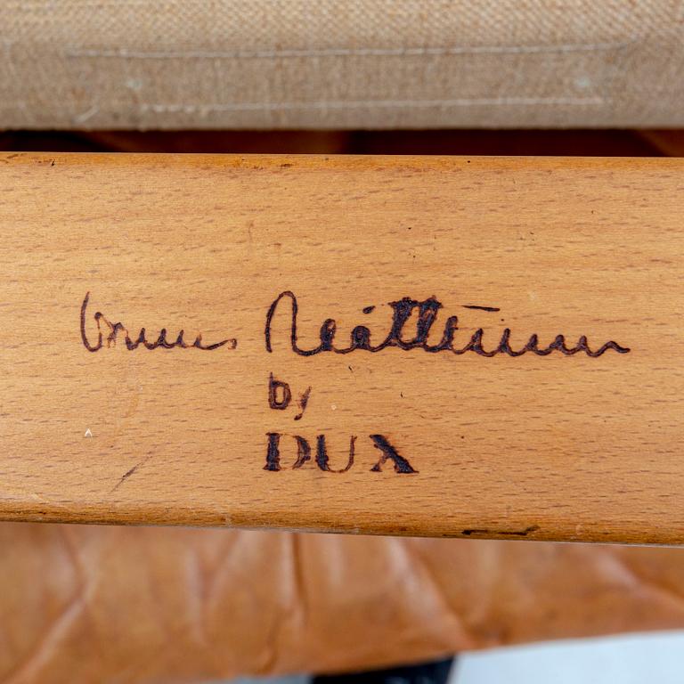 Bruno Mathsson, fåtölj och fotpall "Pernilla" för DUX senare delen av 1900-talet.