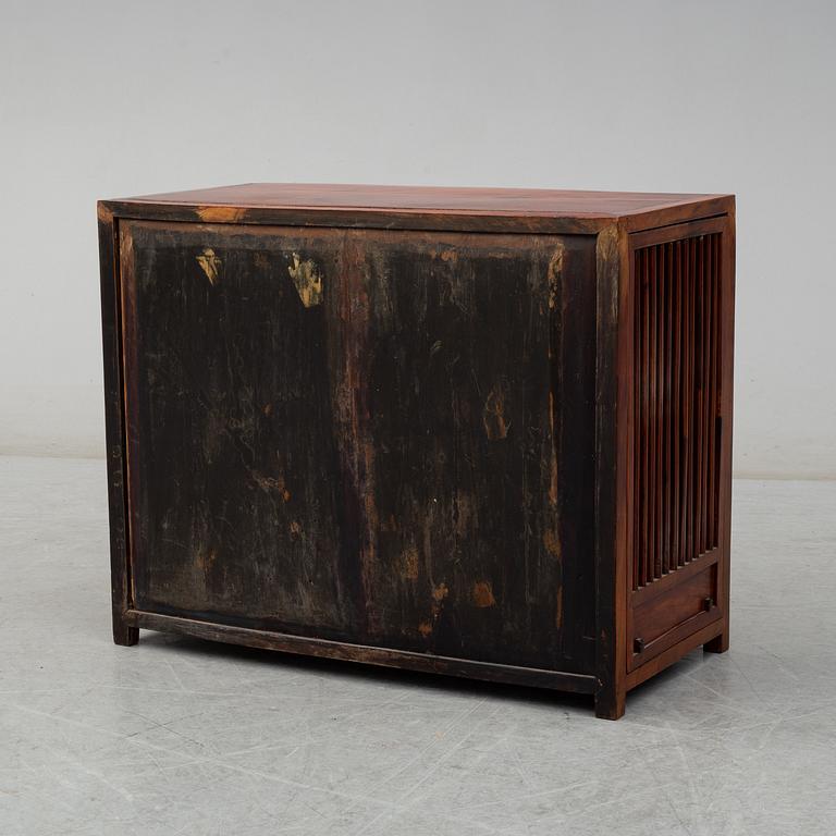 A stained second half of the 20th century cupboard from south-east Asia.