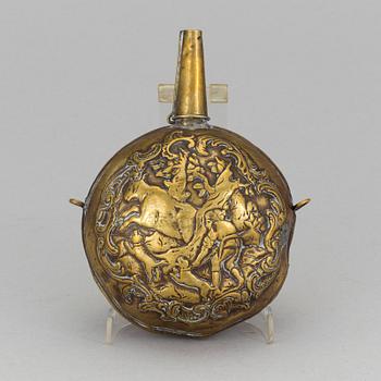 A mid 18th century brass powder flask.