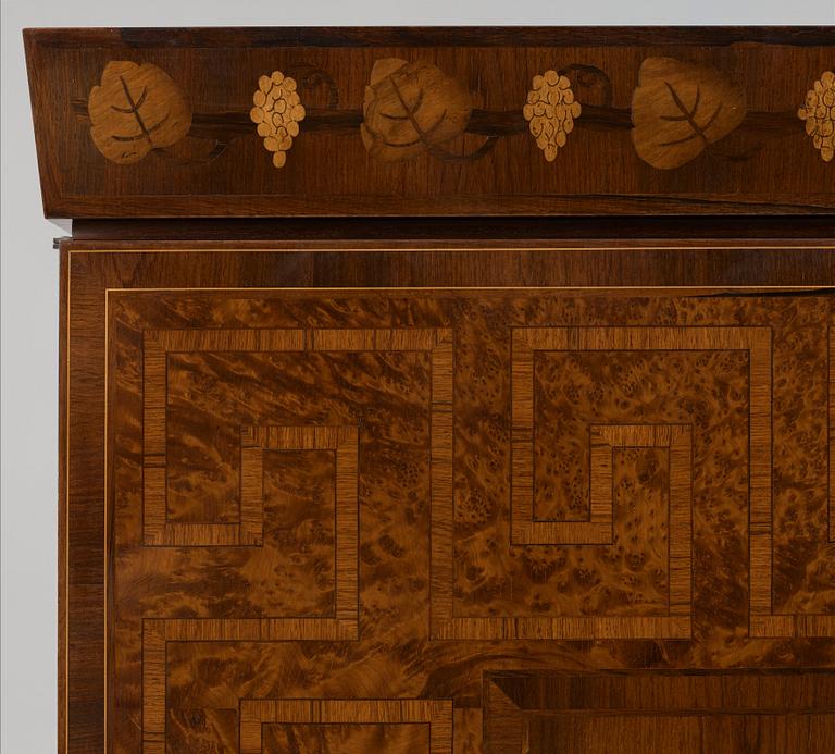 A Gösta Thorell cabinet on stand, Stockholm 1929, executed by Georg Ryman.