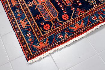A north west persian rug, 218 x 159 cm.