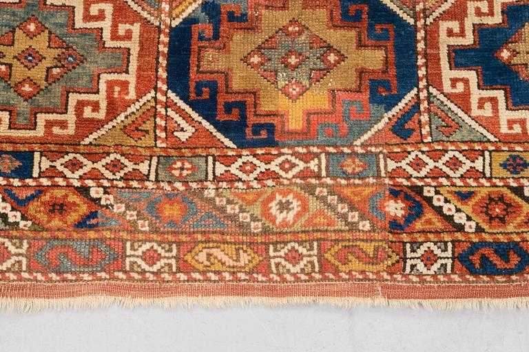 A rug, antique Bergama, ca 199-202 x 154-158 cm (and 2,5-3 cm "flat weave" at the ends),