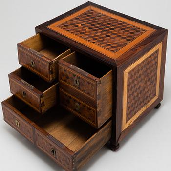 A 19th century chest of drawers.