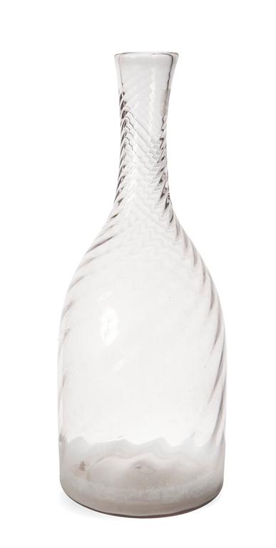 A GLASS DECANTER,