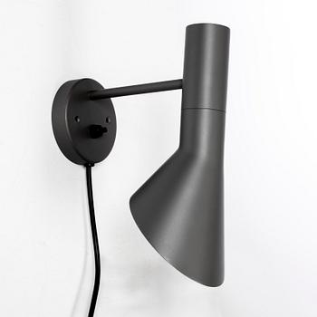 Arne Jacobsen, An 'AJ' wall lamp, Louis Poulsen. 21st century.