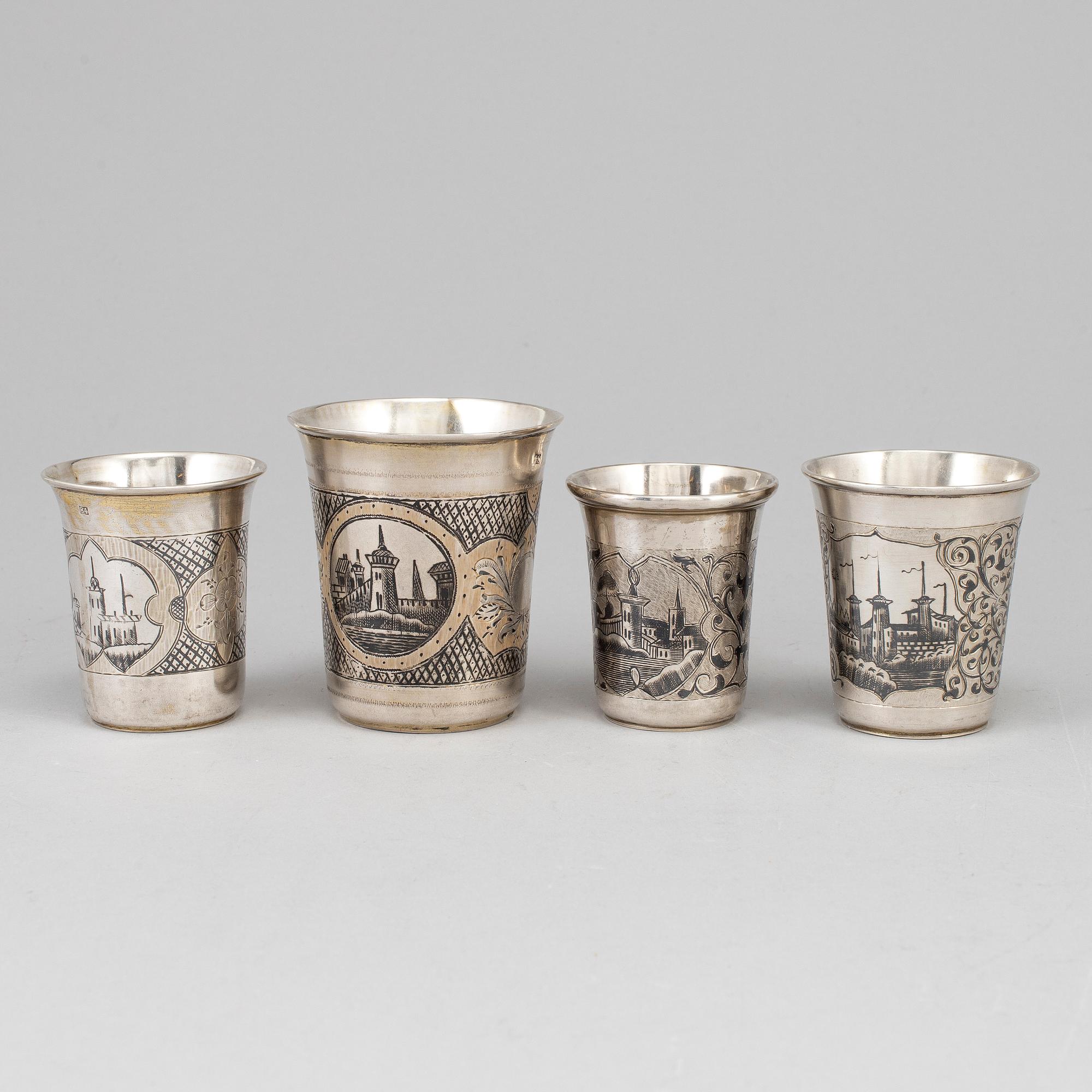 A set of four Russian 19th century silver and niello vodka cups, Moscow.