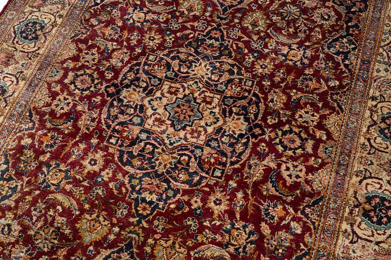 A semi-antique silk Kashan, central Persia, c. 210 x 140 cm.