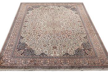 A carpet, silk Kashmir, c. 358 x 252 cm.