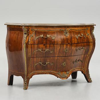 A rococo parquetry commode by C. G. Willkom (master in Stockholm 1763-65).