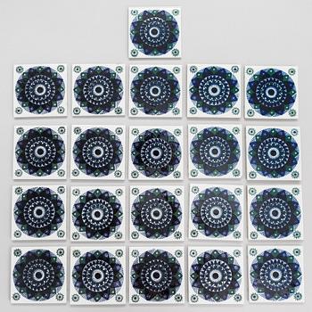Hilkka-Liisa Ahola, a 21-piece set of ceramic 'Sinikukka tiles from the 1960s-70s.