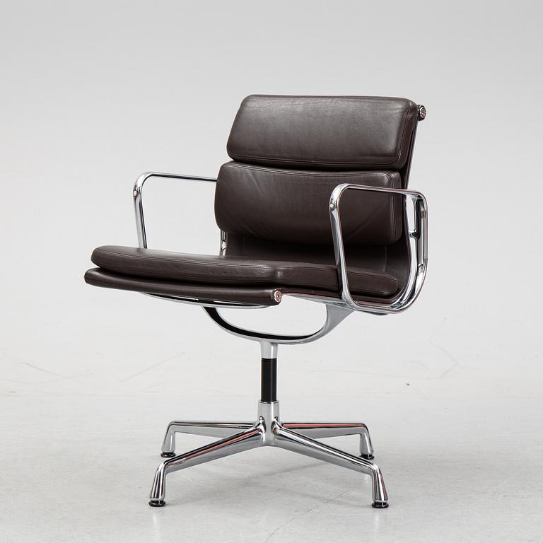 An EA 208 Soft Pad swivel chair by Charles and Ray Eames for Vitra, dated 2010.