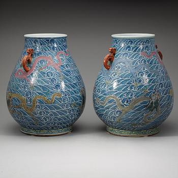 A pair of large enamelled vases with five clawed dragons, presumably late Qing dyasty with Yongzheng mark.