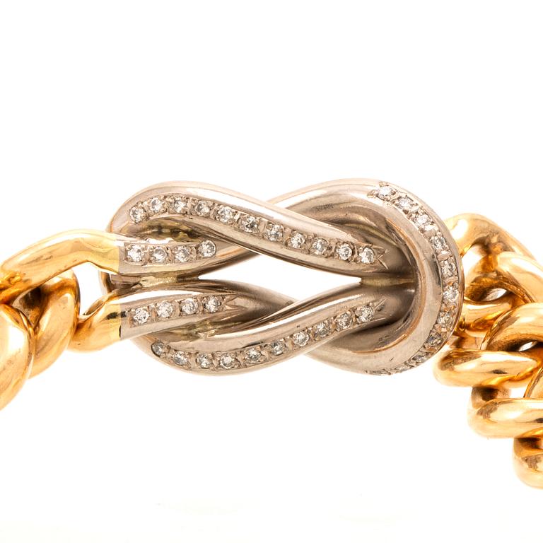 An 18K gold necklace weight 183,6 grams, 0,4 ct brilliants.