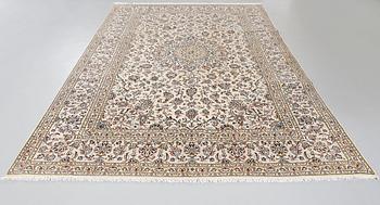 A Keshan rug, 340 x 236 cm.
