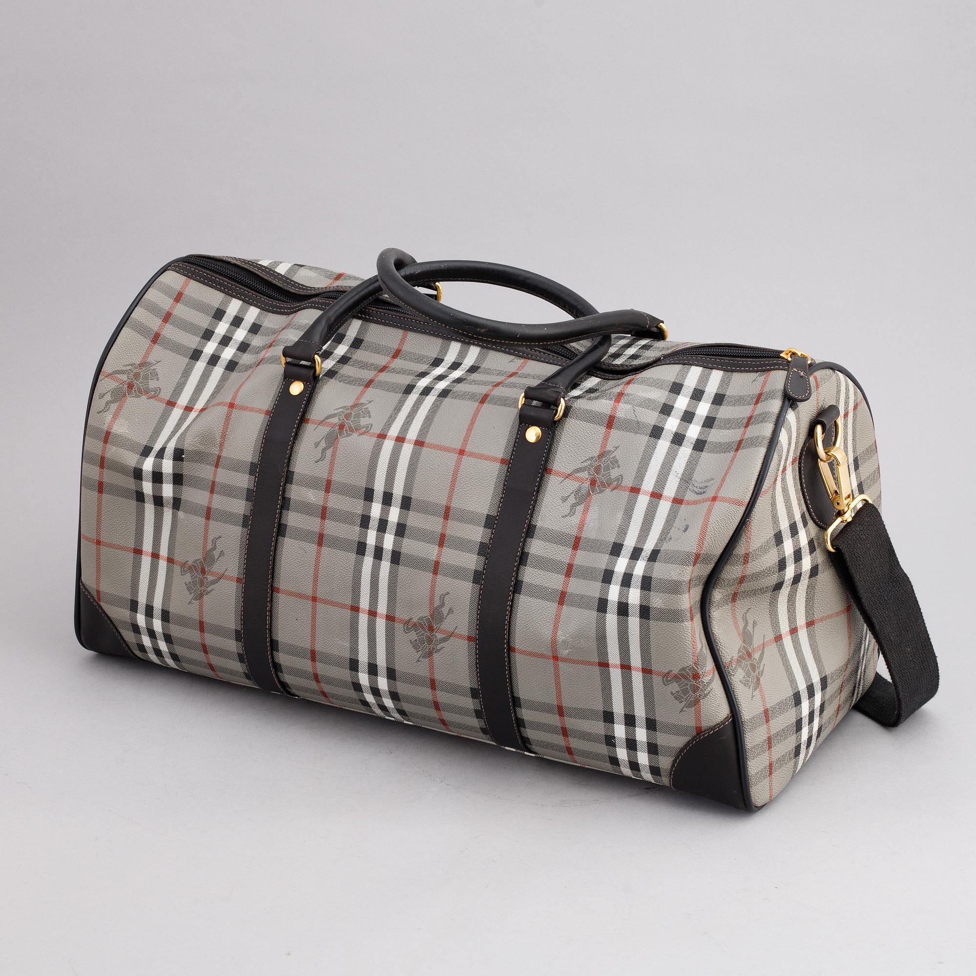 Burberry, a canvas weekend bag.