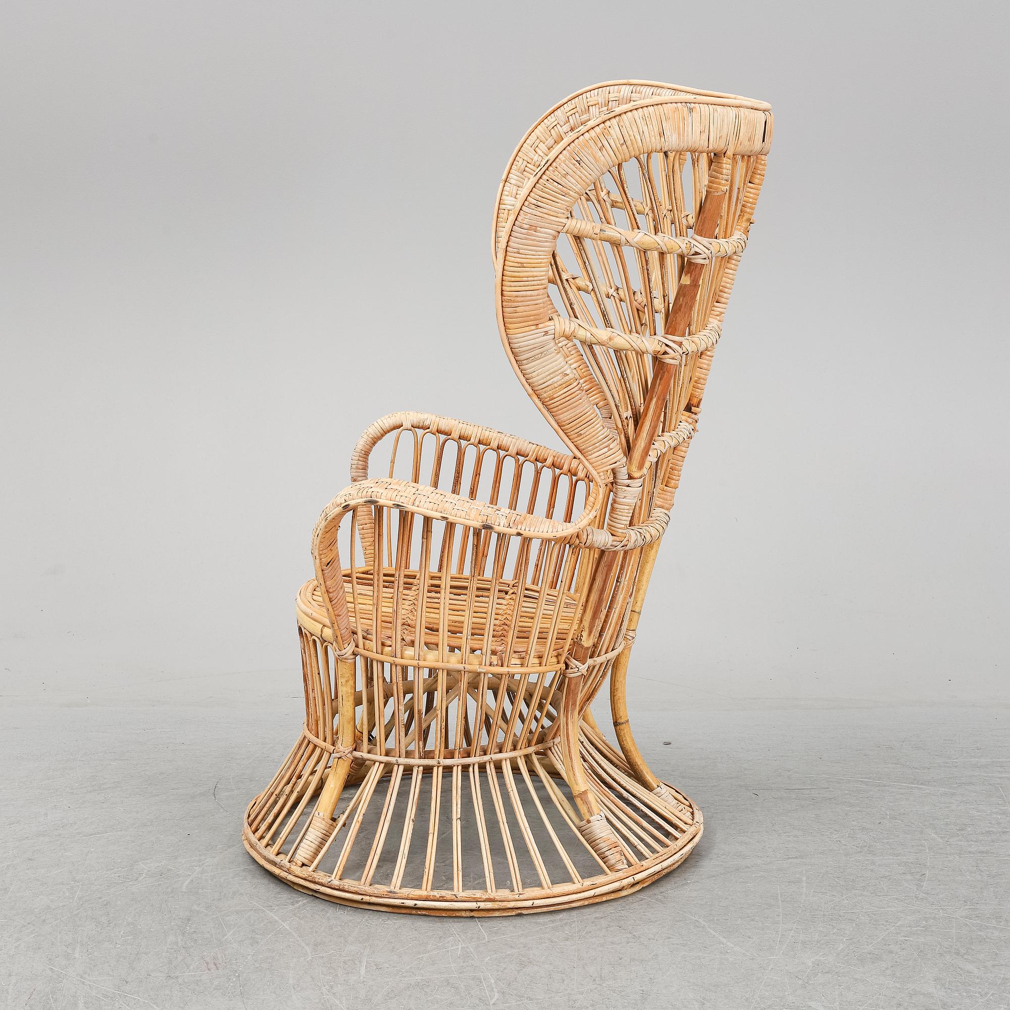 GIO PONTI & LIO CARMINATI, A 'Conte Biancamano' rattan Wingback Armchair for Bonacina, Italy.