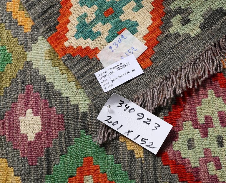 A Kilim rug, c. 201 x 152 cm.