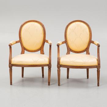 A pair of Louis XVI open armchairs by Niclas-Louis Mariette (maître menuisier in Paris 1765-89).