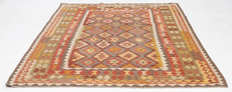 A Kilim carpet, circa 297 x 198 cm.