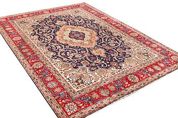 A Tabriz carpet, c. 345 x 255 cm.