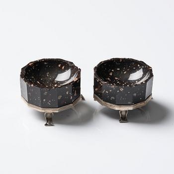 A pair of 'Lika-Risberg' porphyry Empire salts, Älvdalen, Sweden, early 19th century.