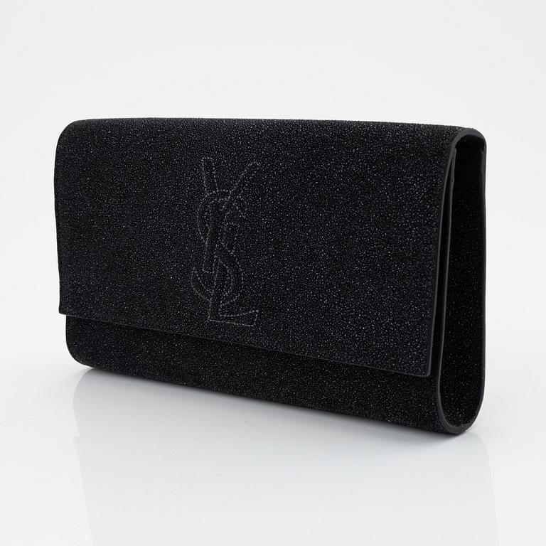 Yves Saint Laurent, a sparkly black leather clutch.