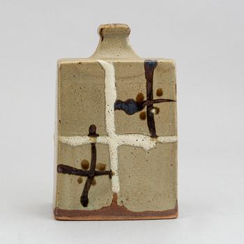 A Japanese sake bottle, in the style of Shojii Hamada, 20th Century.