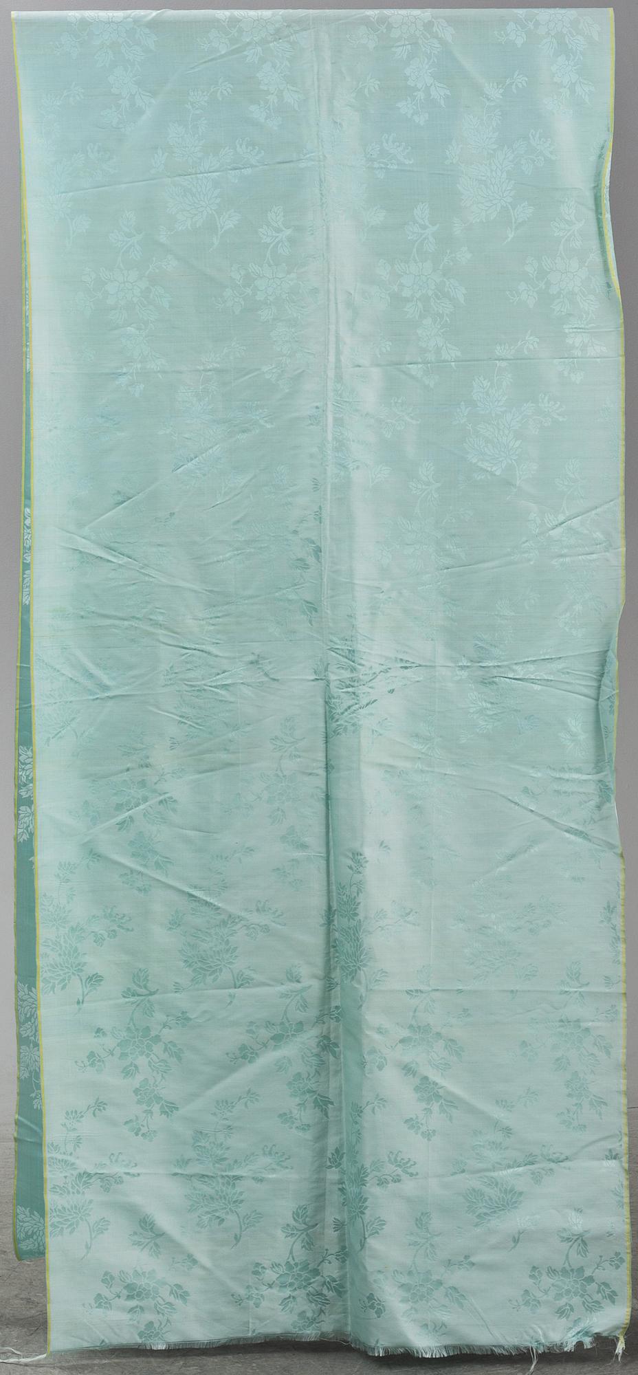 A pale celadon green silk, late Qing dynasty, circa 1900.