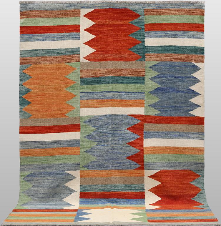 A Kelim carpet, c. 242 x 178 cm.