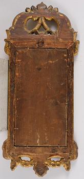 A pair of Gustavian giltwood mirrors by N. Falkengren (master in Jönköping 1776-1813).