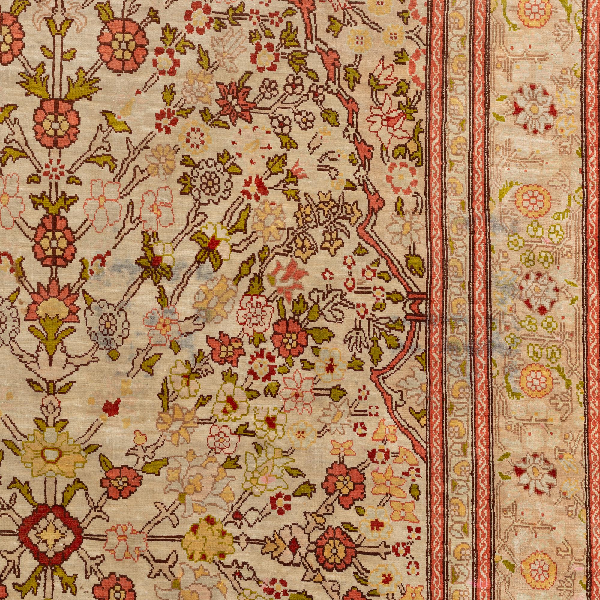 A Hereke silk rug, c. 130 x 87 cm.