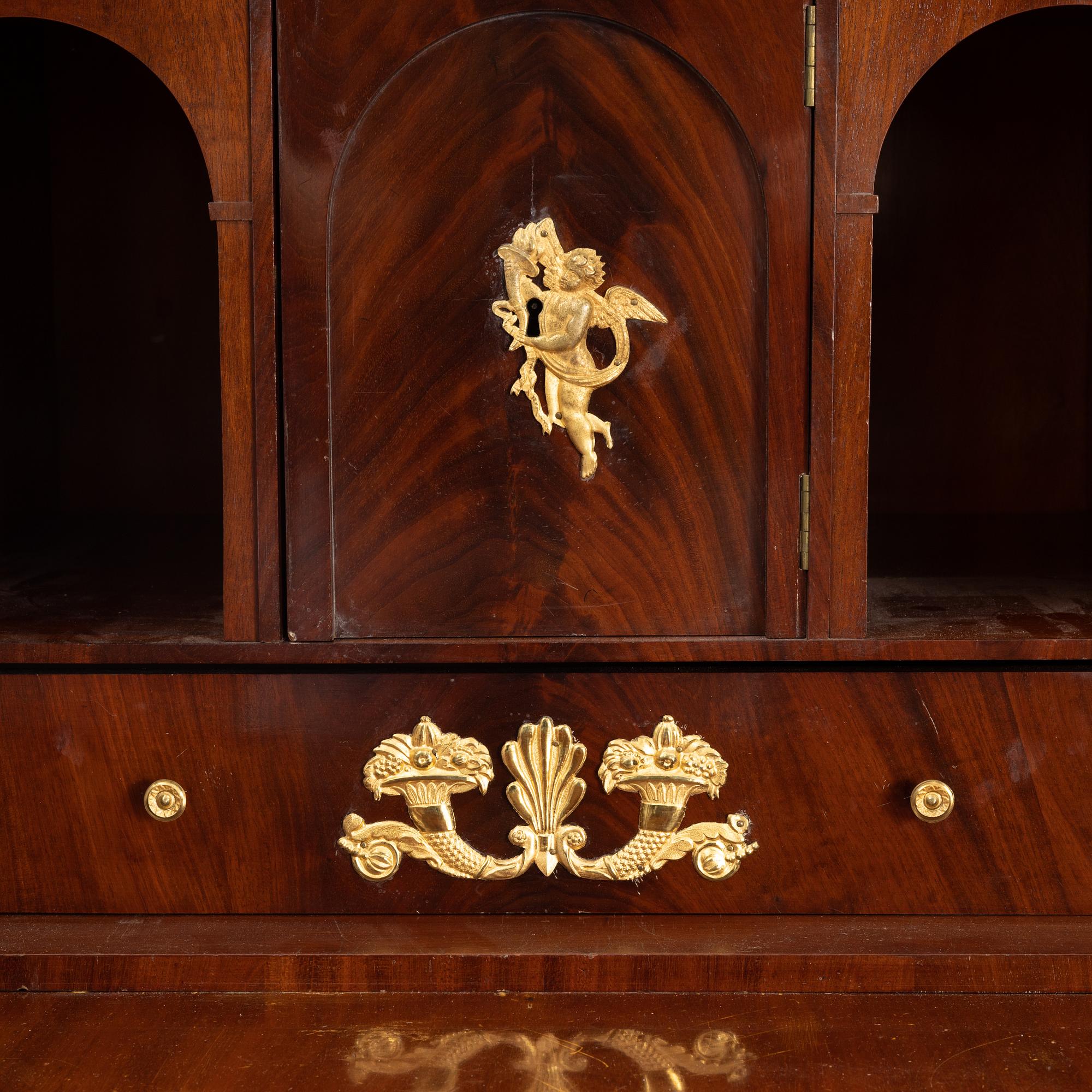 A Swedish Empire secretaire by J. Öman, master 1815-1833.