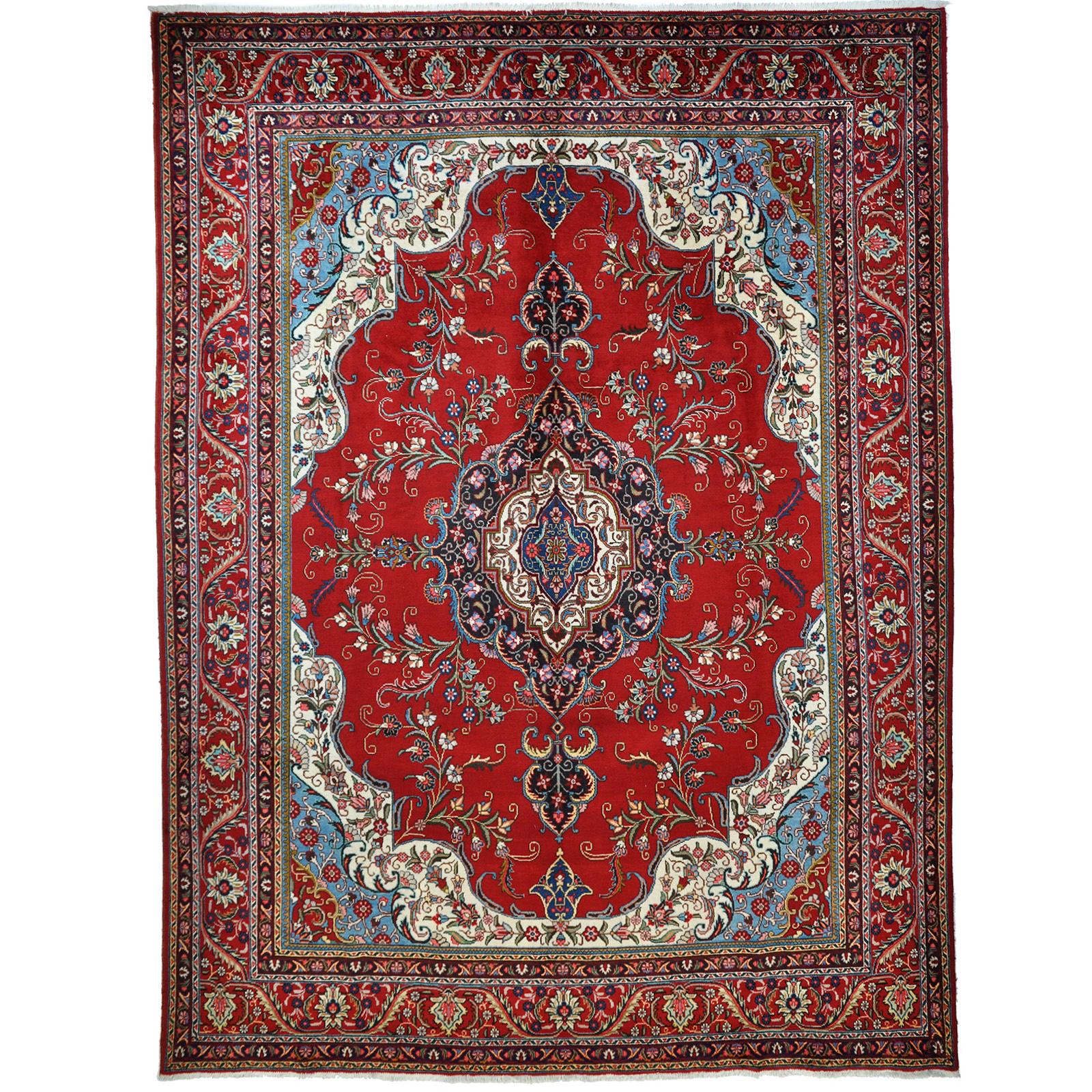 A Tabriz carpet, c 394 x 302 cm.